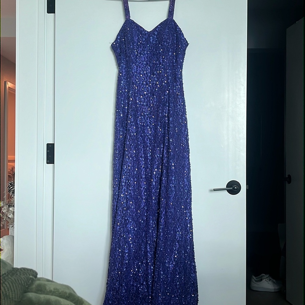 Full length beaded evening gown. Purple size 8. Designer: Sterling Ferris Stone.